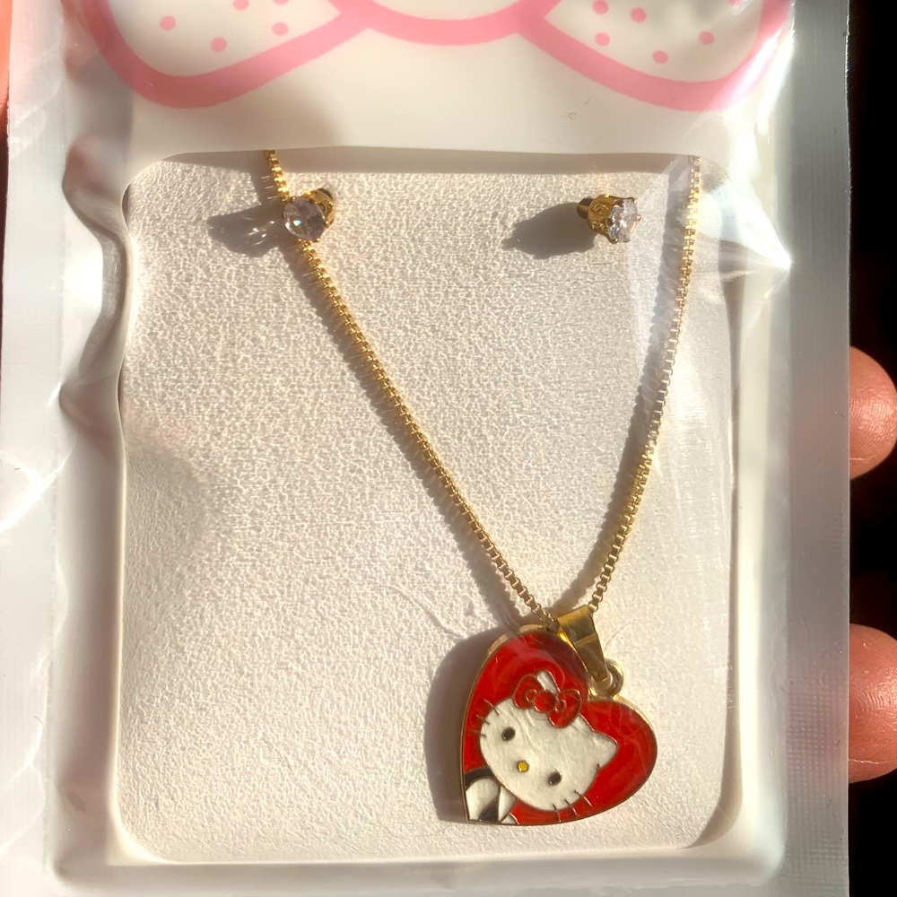 Hello Kitty heart. Stainless steel chain and earrings with an enamel pendant
